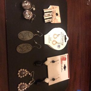 Six pairs of pierced earrings